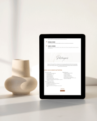 Dubsado proposal showcased on an iPad near a white vase.